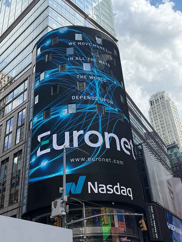An image of the Euronet logo on the NASDAQ tower in Times Square, New York City
