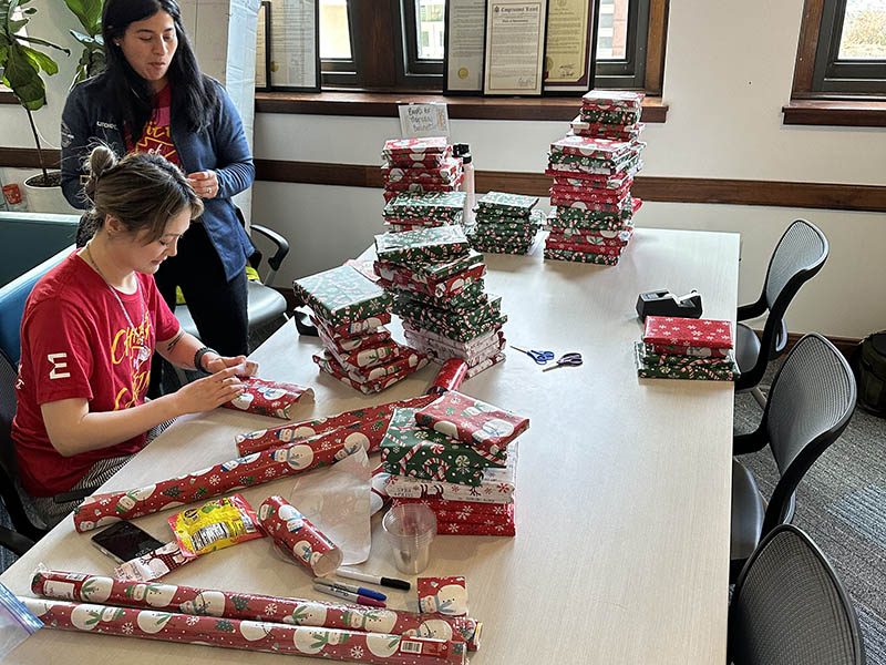 A photo of Euronet employees at one of their Days of Caring during the 2025 holiday season