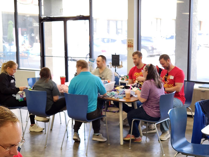 A photo of Euronet employees at one of their Days of Caring during the 2025 holiday season