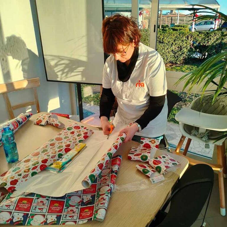 An image of Ria employees serving at Ronald McDonald House in Italy